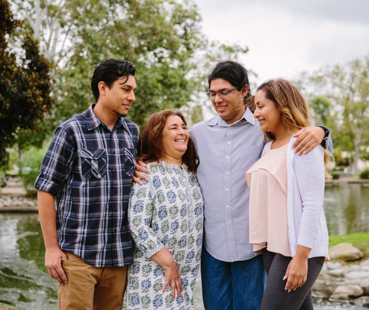 A SchoolFirst FCU Member family image.