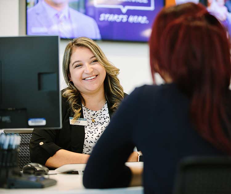 A SchoolsFirst FCU Crocker Village branch teammember.